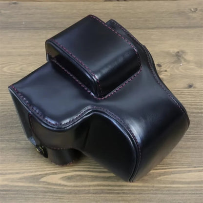 For Canon EOS R50 / R100 PU Leather Camera Case Battery Opening Design Camera Cover with Strap and Small Bag