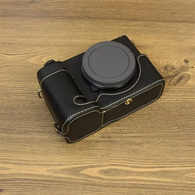 For Sony ZV-E1 Battery Opening Design PU Leather Camera Bottom Cover Half Body Case with Hand Strap