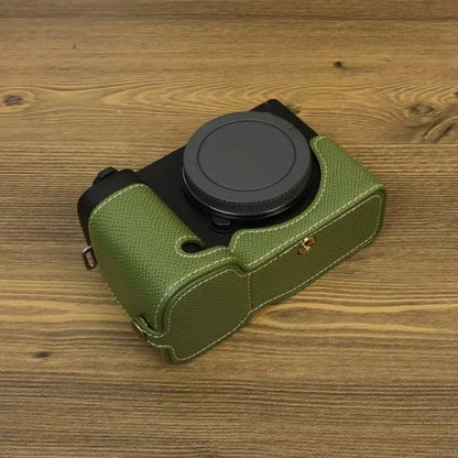 For Sony ZV-E1 Battery Opening Design PU Leather Camera Bottom Cover Half Body Case with Hand Strap